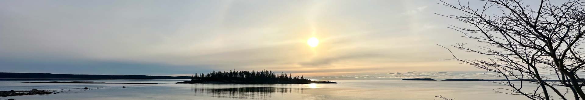 Bright sun over island