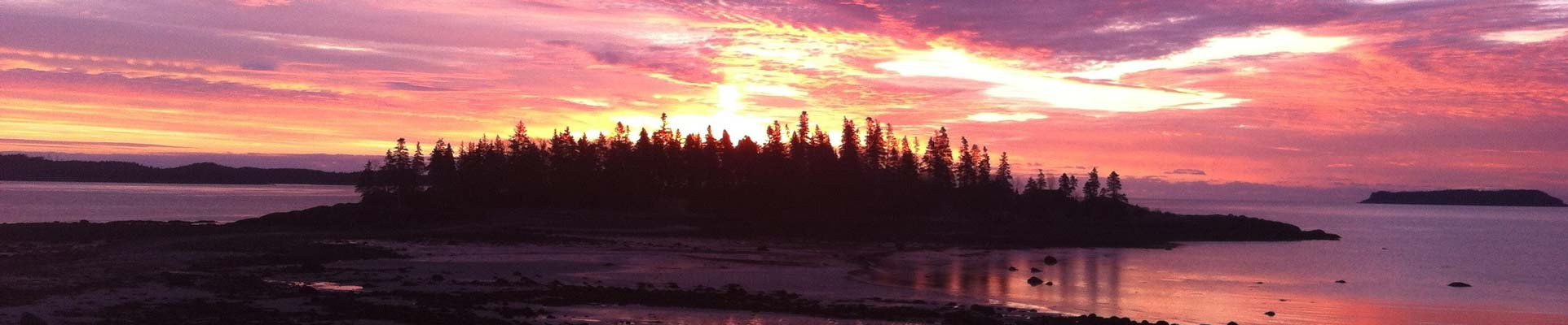 Pink sunset over island